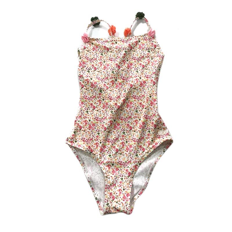 Girl's printed swimsuit with fancy trims at strap